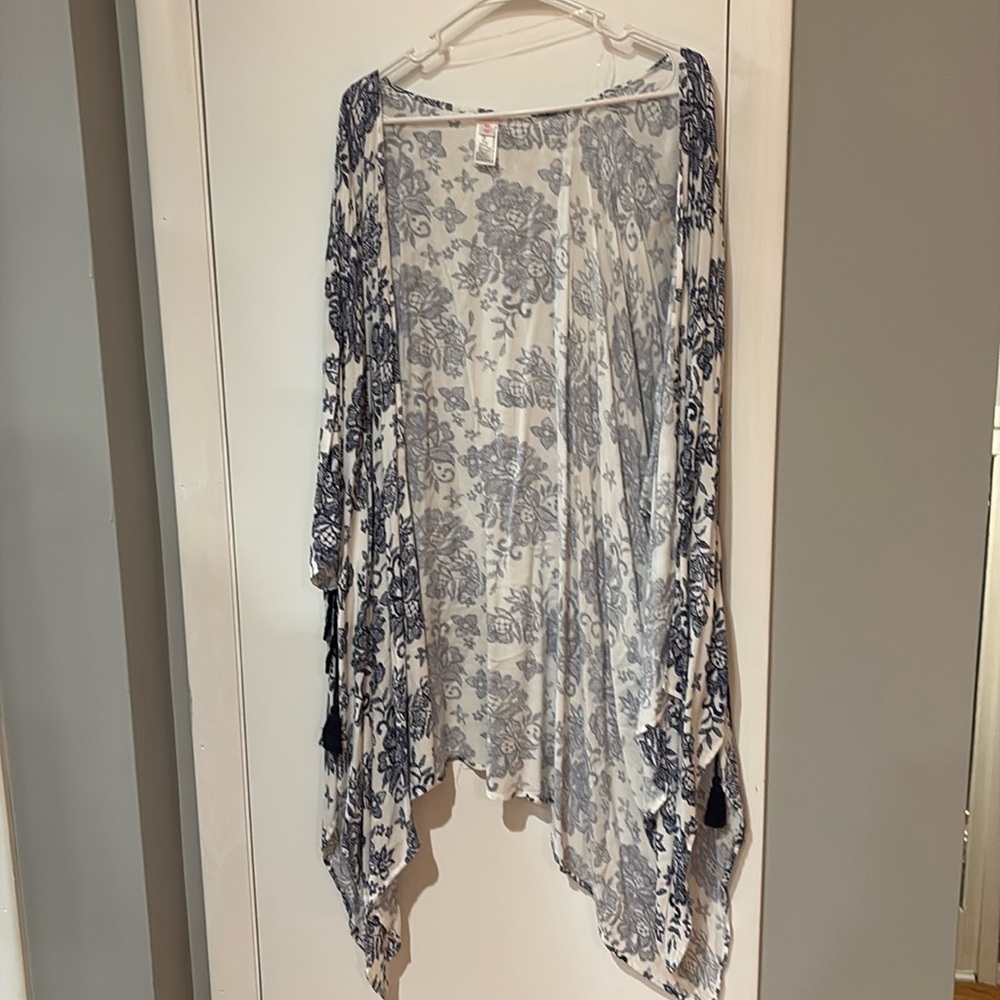 Never worn beach cover blue pattern on white with blue rope ties